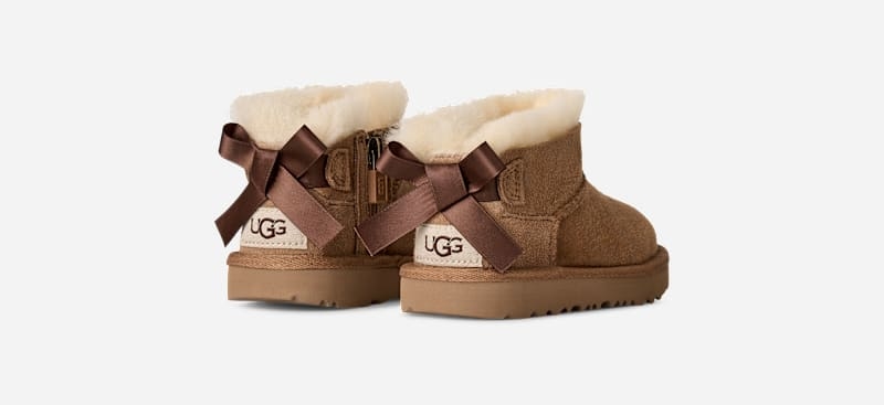 UGG® Ultra Mini Bailey Bow Boot 'Chestnut' 1185920T-CHE