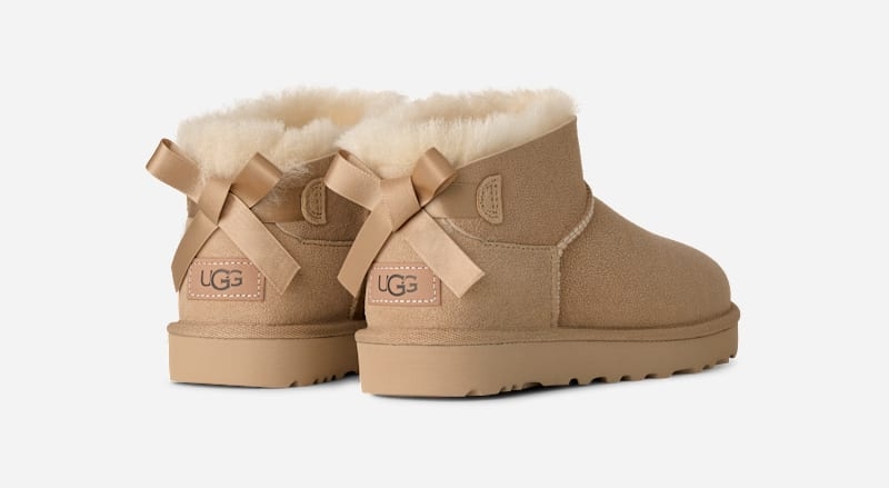 UGG® Ultra Mini Bailey Bow Boot 'Sand' 1185491-SAN