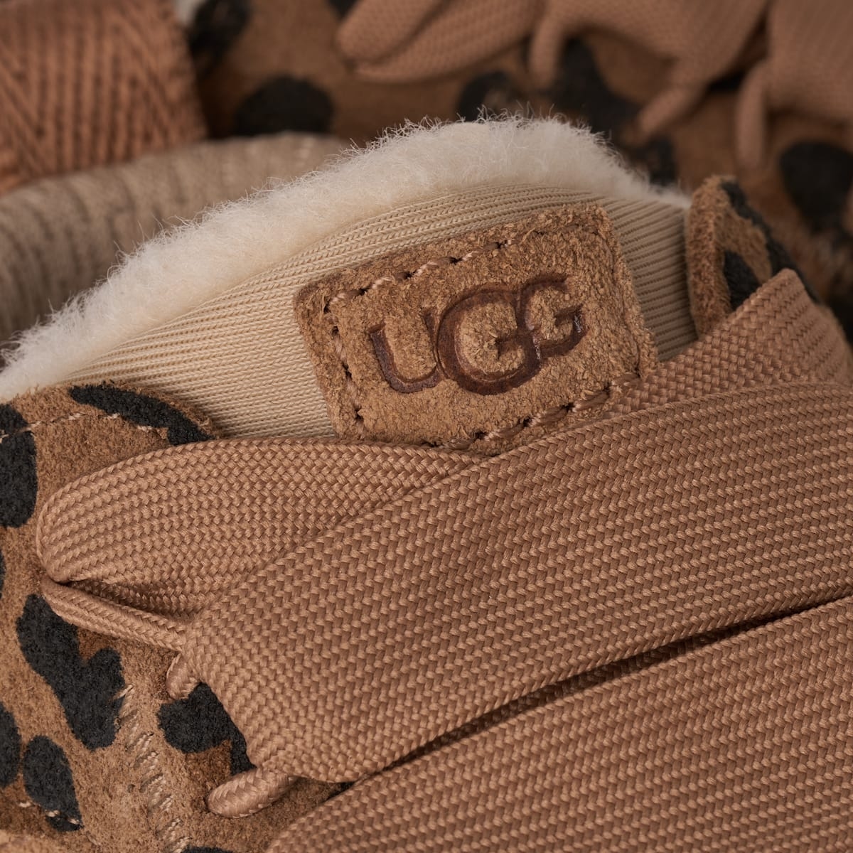 UGG® Lowmel Spotted Bootie 'Tan' 1187372I-TAN
