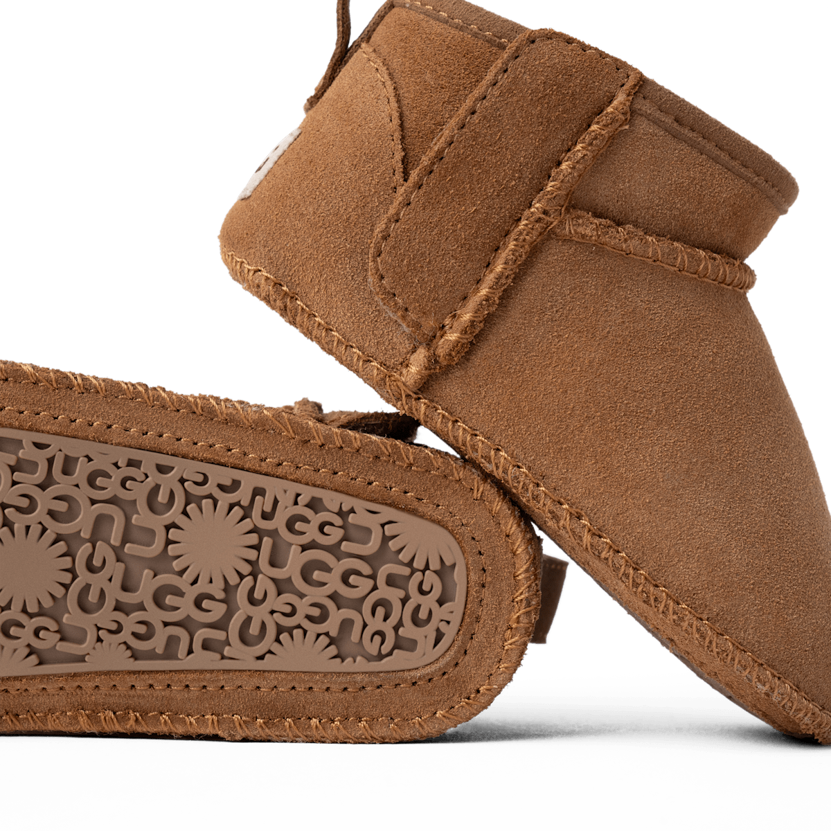 UGG® Classic Ultra Mini Bootie Kids Brown 1157690I-CHE