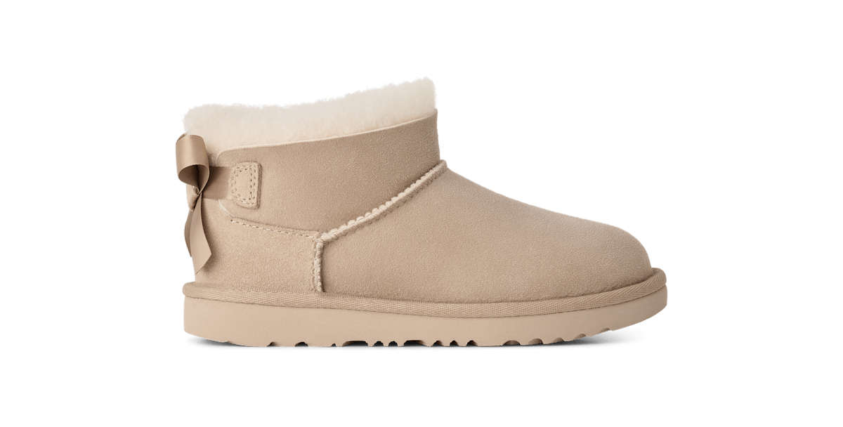 UGG® Ultra Mini Bailey Bow Boot 'Sand' 1185920K-SAN