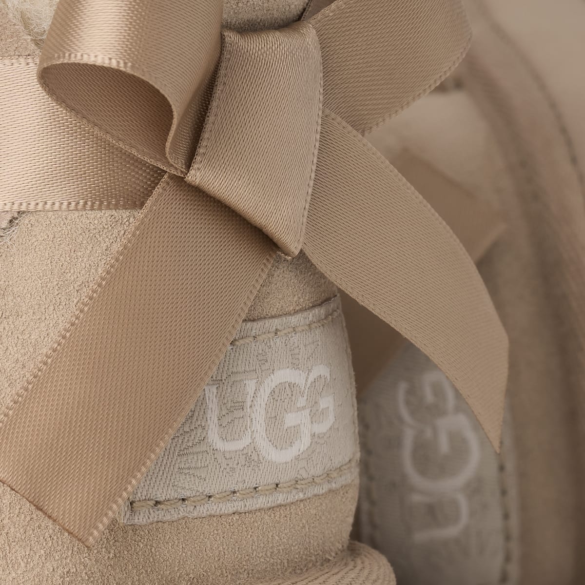 UGG® Ultra Mini Bailey Bow Boot 'Sand' 1185920K-SAN