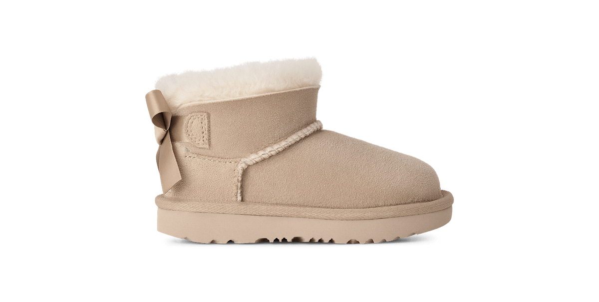 UGG® Ultra Mini Bailey Bow Boot 'Sand' 1185920T-SAN