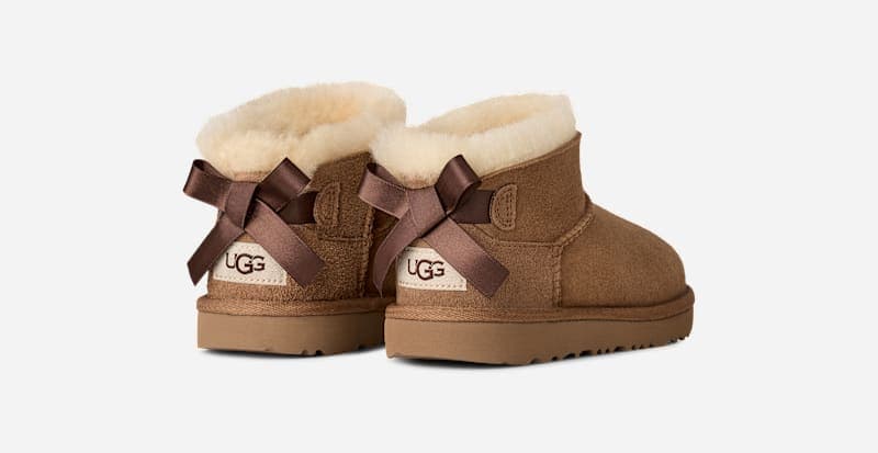 UGG® Ultra Mini Bailey Bow Boot 'Chestnut'