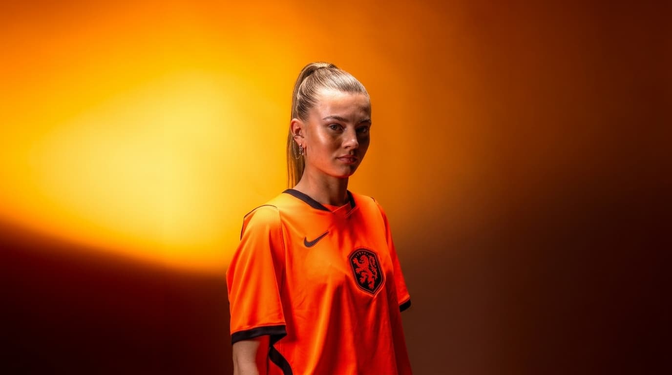 Model wearing the Dutch Nike Stadium home jersey in Orange
