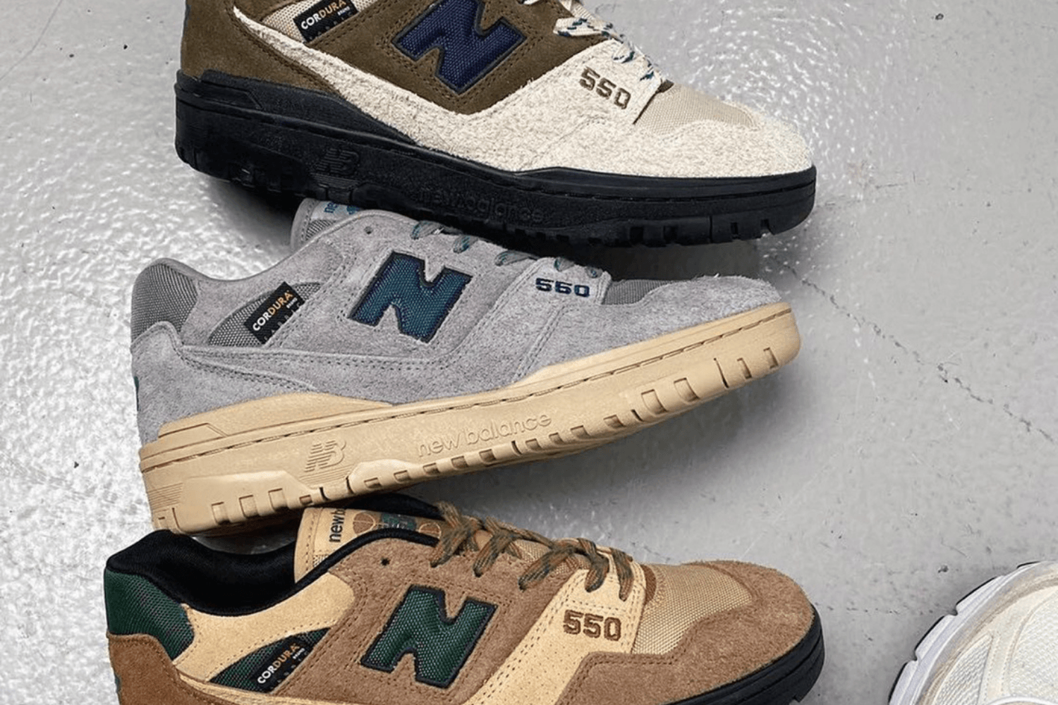 size? comes with three exclusive New Balance 550s