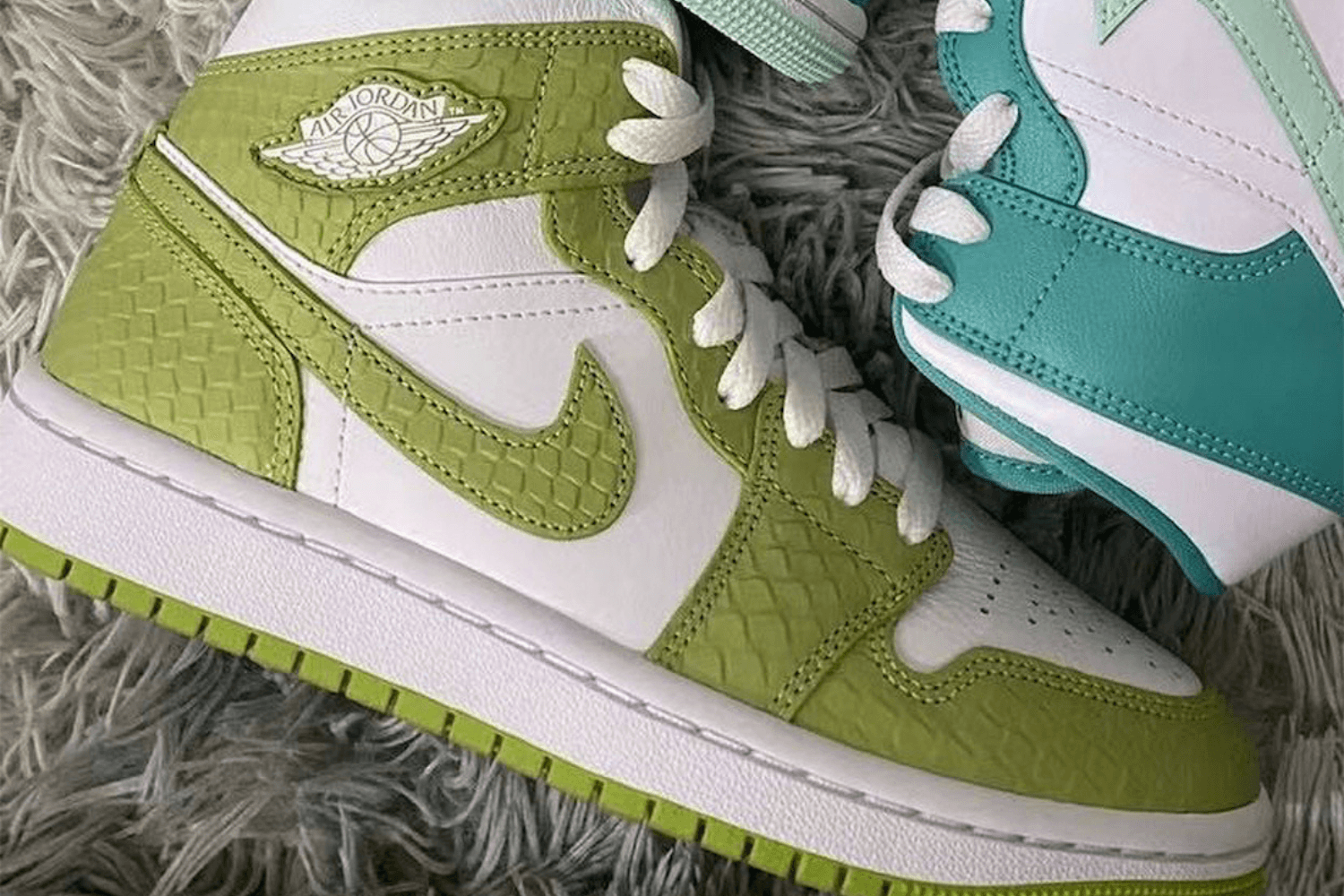 First images of the Air Jordan 1 WMNS Mid 'Green Python'
