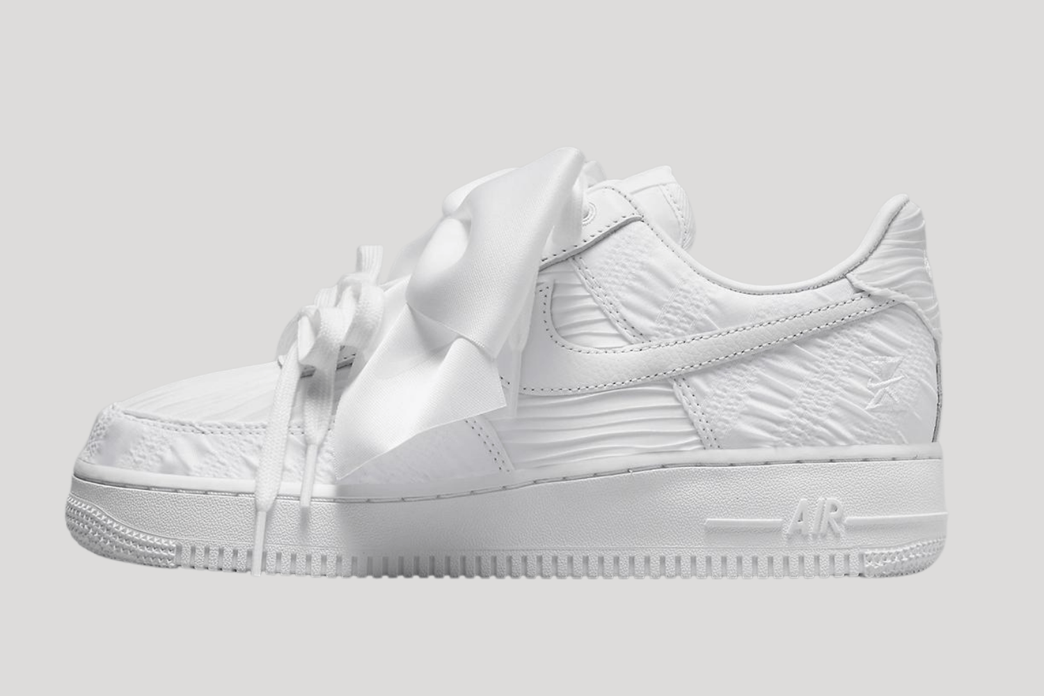 Nike Air Force 1 Low gets a big bow on this women's exclusive