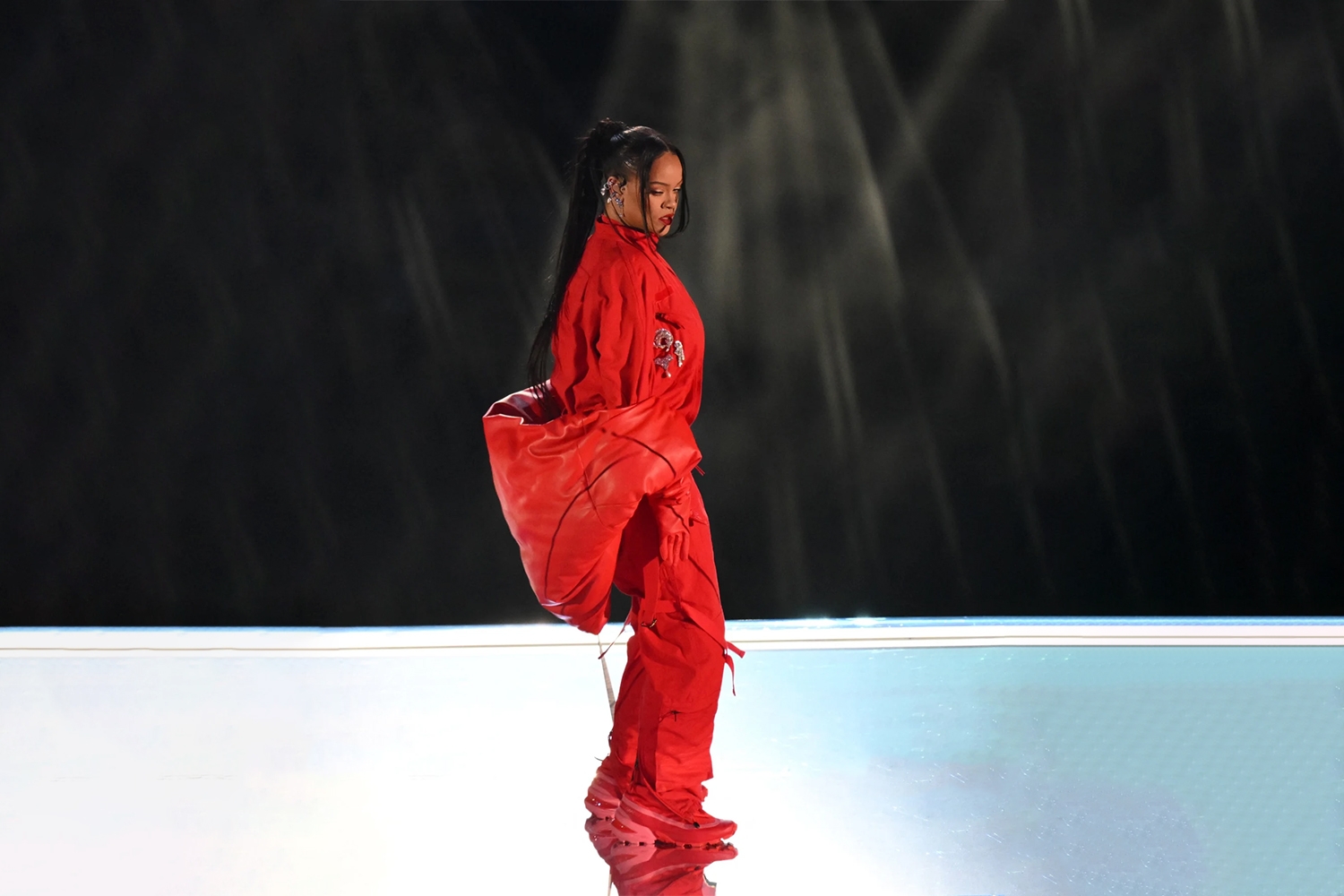 Rihanna wears Maison Margiela MM6 x Salomon Cross Low during Super Bowl performance