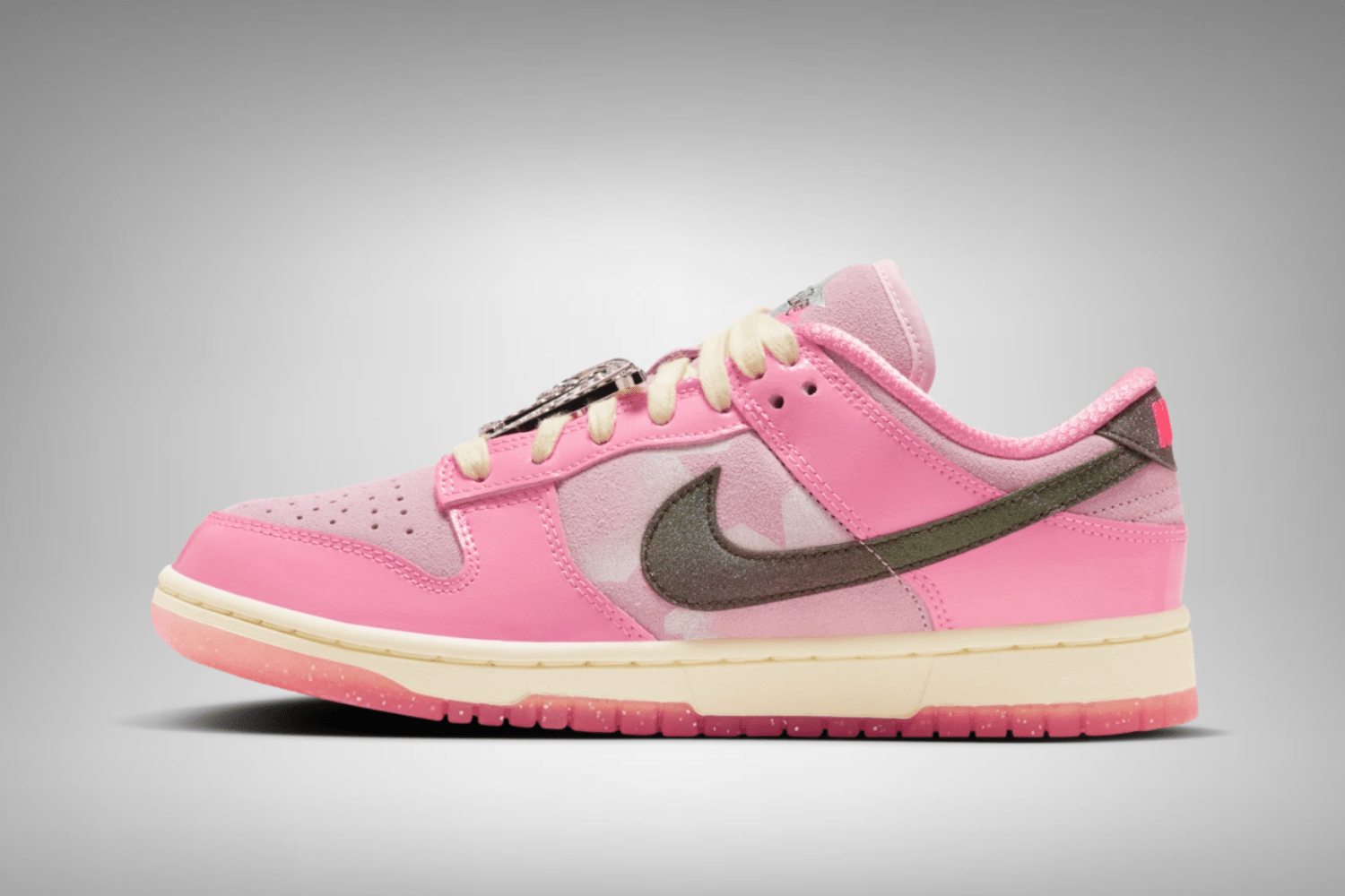 In-hand shot of the Nike Dunk Low WMNS 'Barbie'