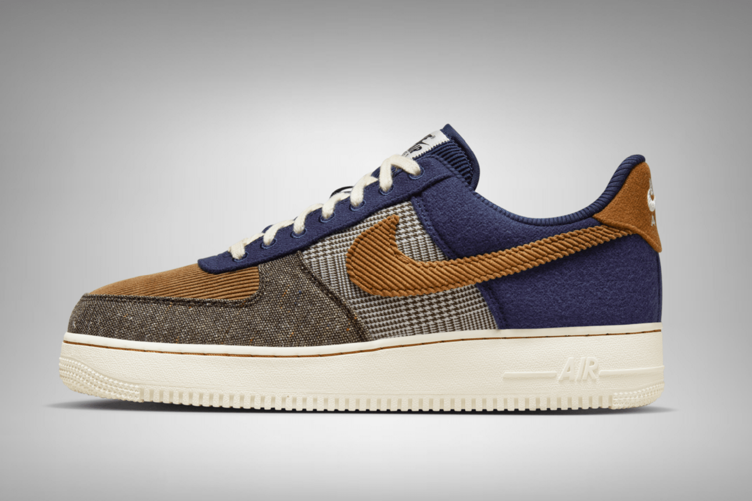 The Nike Air Force 1 Low comes in a combination of tweed and corduroy