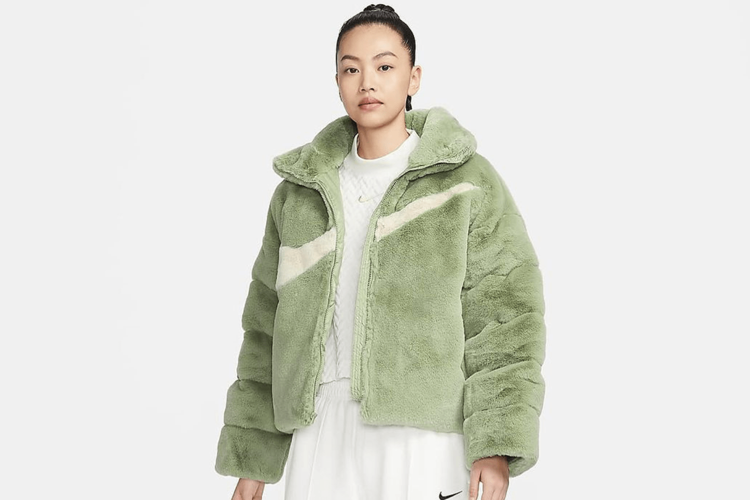 The Nike Big Swoosh returns on a puffer jacket