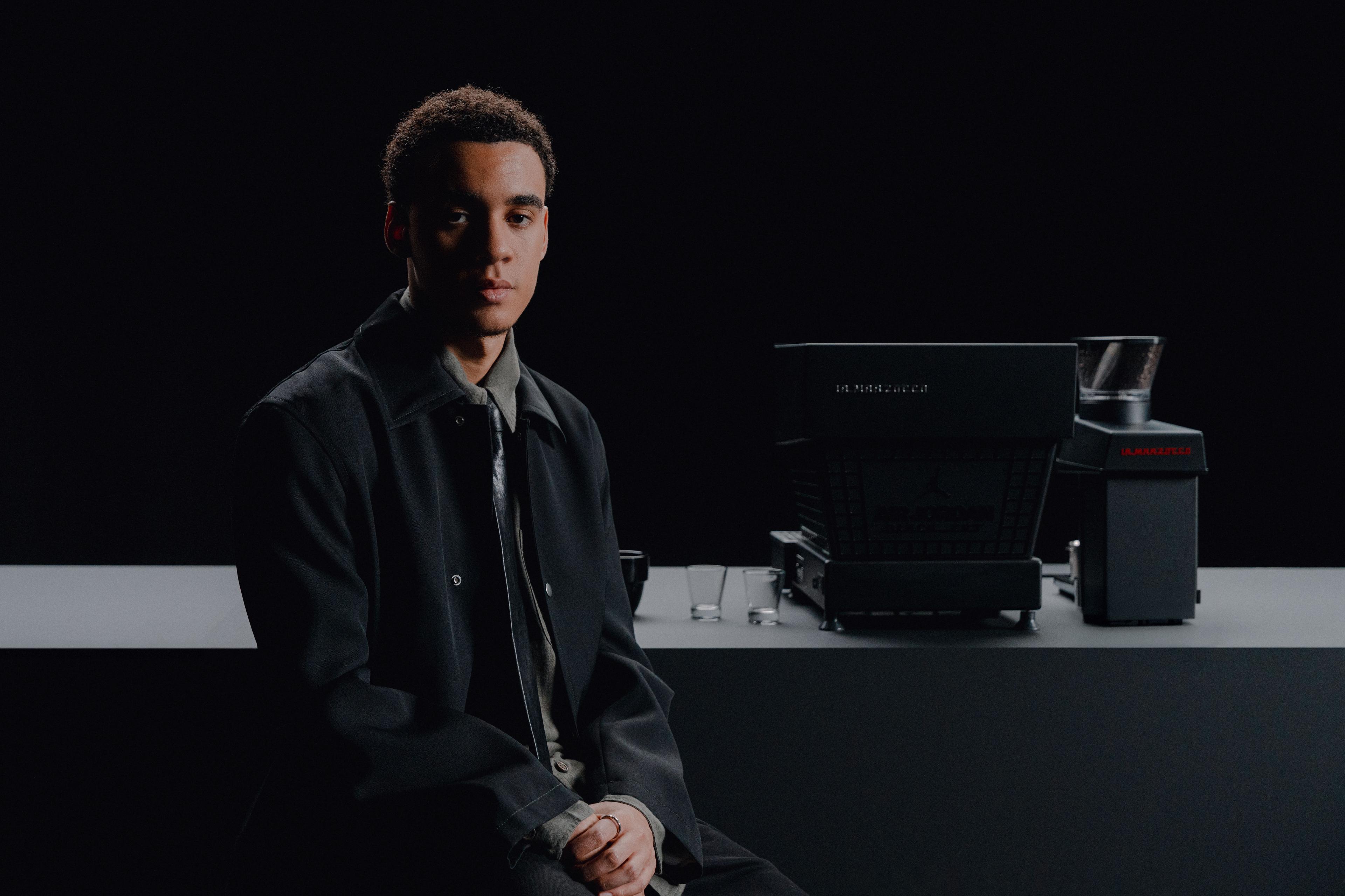 Jamal Musiala Air Jordan 4 Black Cat solebox